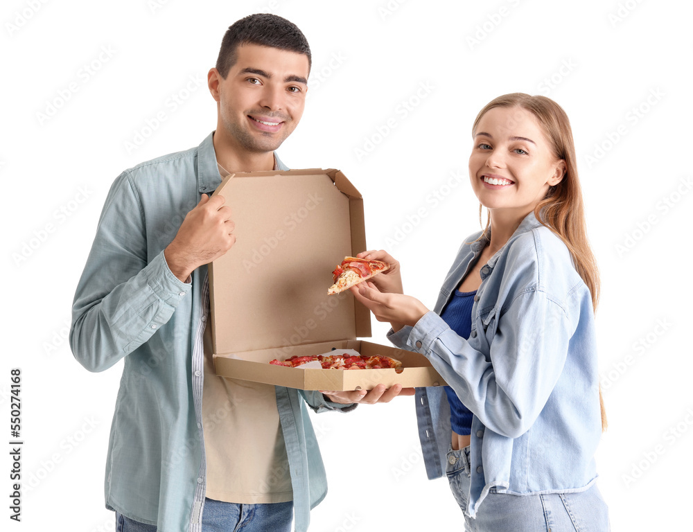 Happy young couple eating fresh pizza on white background Happy young couple eating fresh pizza on white background