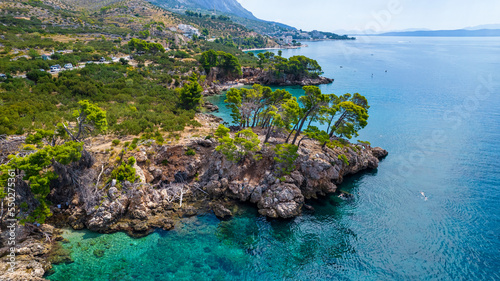 Attractive morning seascape of Adriatic sea. Marvelous summer view of small beach in famous resort - Brela, Croatia, Europe. Beautiful world of Mediterranean countries.