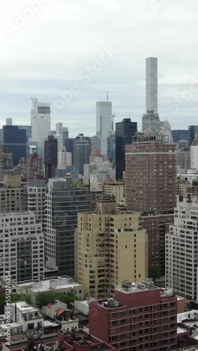 aerial view of drone over the streets of midtown new york.  vertical video for smart phone