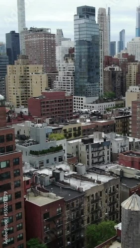 Aerial drone view of midtown New York skyline. Vertical video for smart phone, copy space