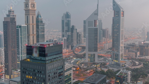 Photography Skyscrapers on Sheikh Zayed Road and DIFC night to day timelapse in Dubai, UAE
