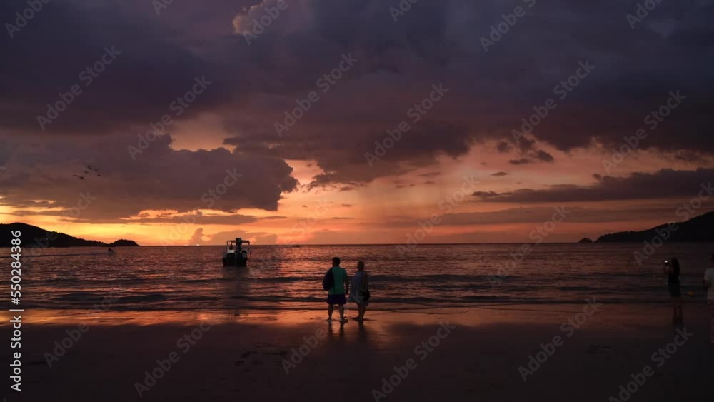 Sunset at the famous Patong beach. One of Thailand's most important tourist beaches. 4K video. Sunset at the famous Patong beach. One of Thailand's most important tourist beaches. 4K video.
