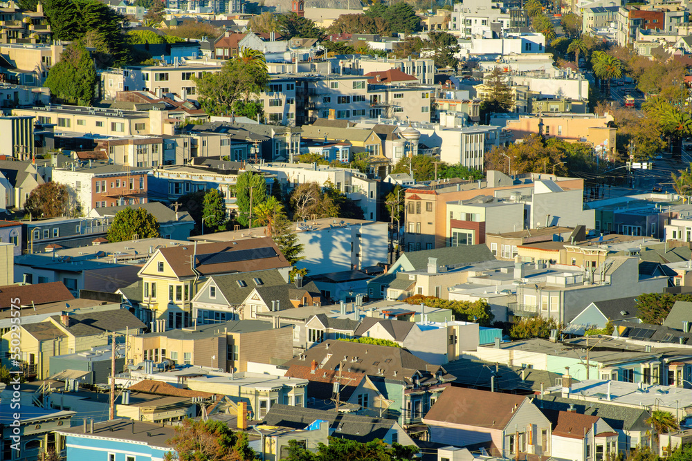 Dense urban area with buildings and structures or homes and houses in neighborhood or downtown part of san francisco california