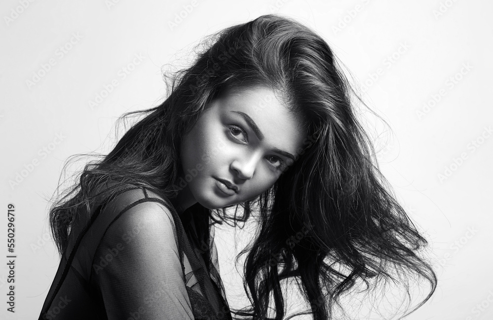 Monochrome woman beautiful hairstyle fashion portrait. Make-up detail.
