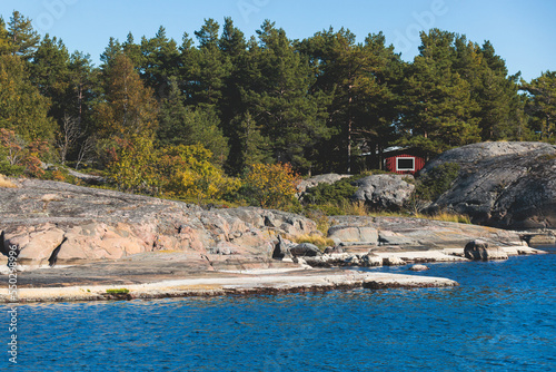 Archipelago National Park landscape, Southwest Finland, with islands, islets and skerries, Saaristomeren kansallispuisto, summer sunny day, view from shuttle ship ferry boat in the Archipelago Sea photo