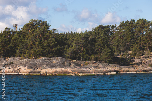 Archipelago National Park landscape, Southwest Finland, with islands, islets and skerries, Saaristomeren kansallispuisto, summer sunny day, view from shuttle ship ferry boat in the Archipelago Sea photo