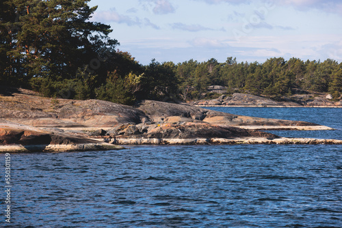 Archipelago National Park landscape, Southwest Finland, with islands, islets and skerries, Saaristomeren kansallispuisto, summer sunny day, view from shuttle ship ferry boat in the Archipelago Sea photo
