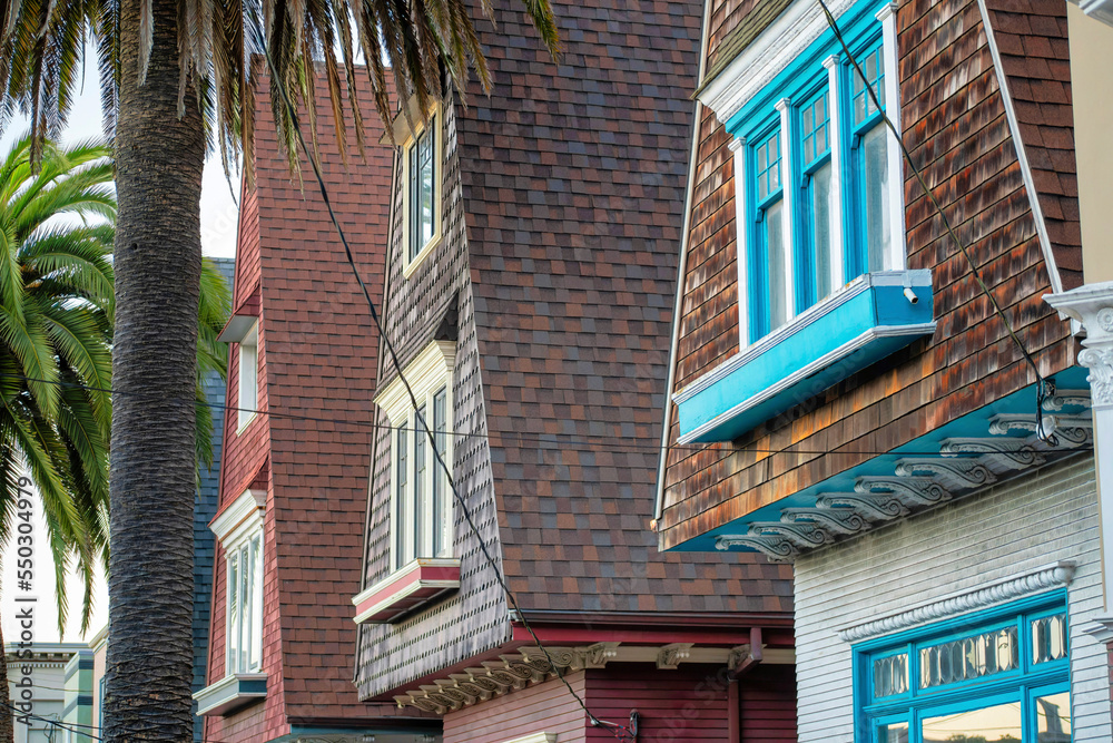 Exterior house facades in the historic districts of downtown san francisco with visible windows and wooden slats and pannels