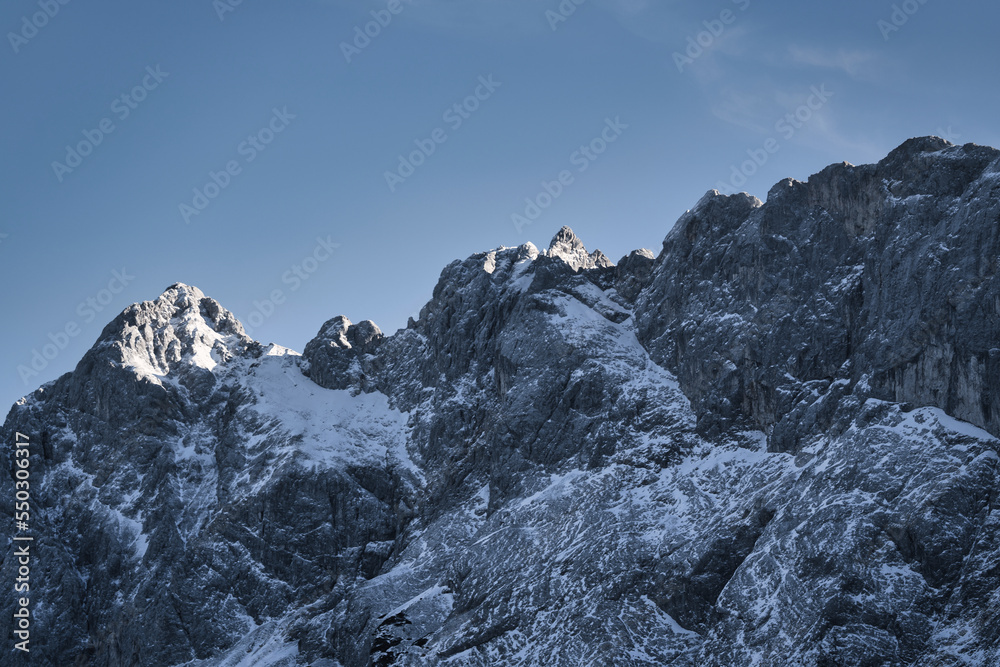 snow covered mountains with blue sky and clouds - Zugspitze, Alps