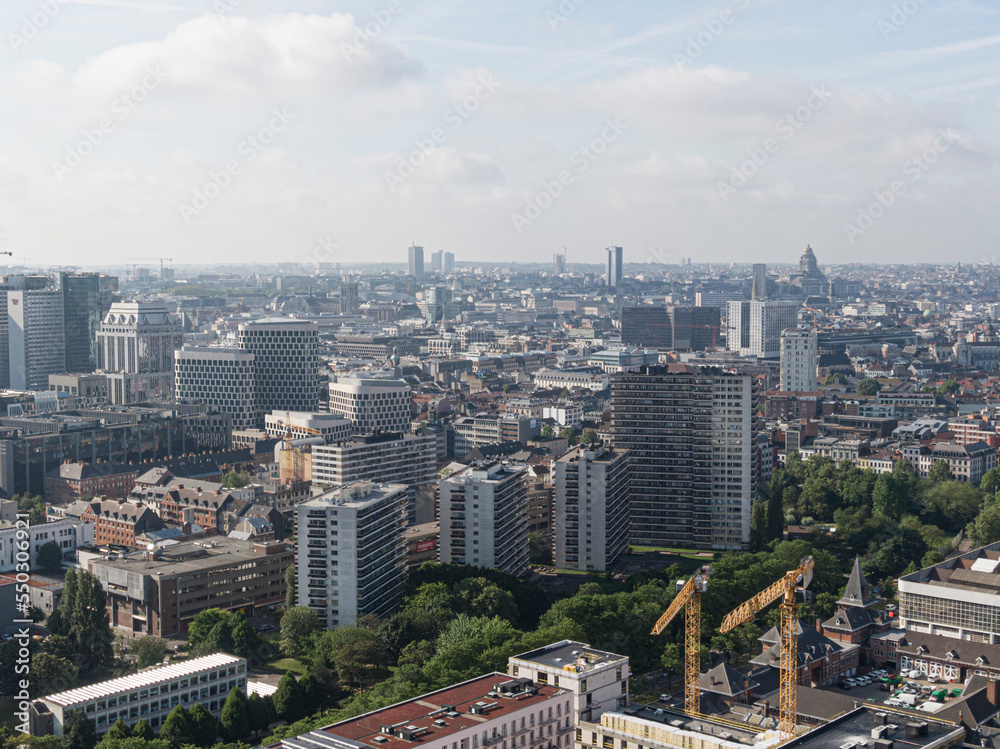 Brussels, Belgium - May 12, 2022: Urban landscape of the city of Brussels. Office district mixed with residential buildings in a residential area.