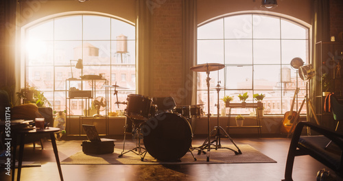 Fototapeta Establishing Shot: Music Rehearsal Studio in Loft Room with Drum Set in the Middle