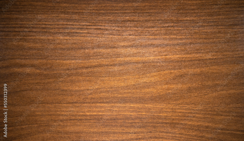 Photo of the texture of natural mahogany for the manufacture of luxury furniture.Wooden background for text. beautiful texture of the wooden background. Photo of the texture of natural mahogany for the manufacture of luxury furniture.Wooden background for text. beautiful texture of the wooden background.