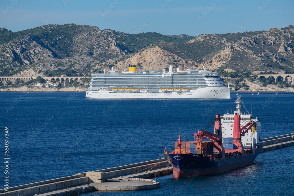 Costa cruiseship or cruise ship liner Toscana in Marseille Provence port on sunny day blue sky during Mediterranean cruise dream vacation	