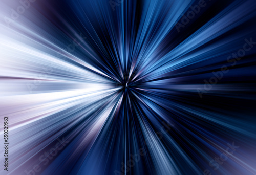 Abstract surface of radial blur zoom in deep blue and lilac tones. Gloomy blue background with radial, diverging, converging lines.
