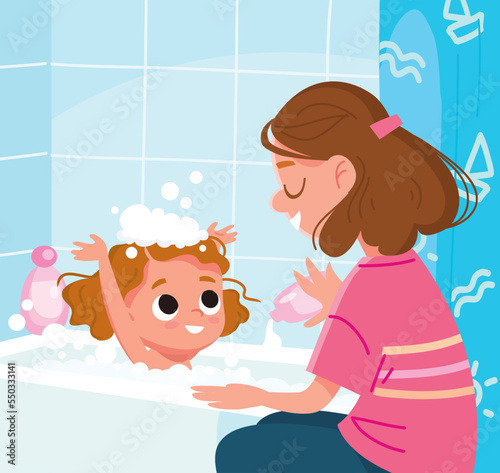 Mother washes her baby in bathroom. Baby girl taking bubble bath with foam all over the body and on the head. Mom bathing kid, child in large tub. Kids hygiene.