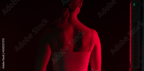Woman getting red light therapy on her back