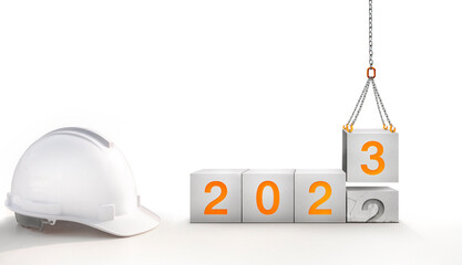 The year 2023 in the concrete cube. The construction crane is lifting the new number 3 to replace the old number 2.