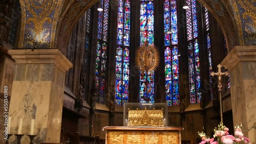 Aachen, Germany - October 10, 2022: Beautiful vintage stained glass windows inside in front of the altar of the ancient Aachen Cathedral
