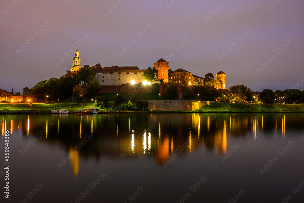 Fototapeta premium Wawel Castle at Vistula River in central Krakow, Poland