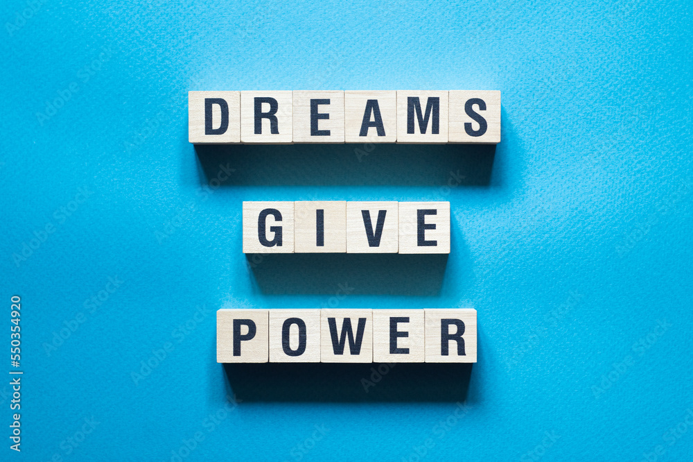 Dreams give power word concept on cubes