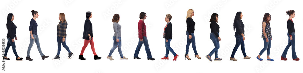 side view of group of women with jeans walk on white background side view of group of women with jeans walk on white background