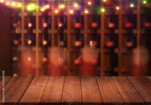 christmas lights on wooden table, wine cellar blur background wallpaper