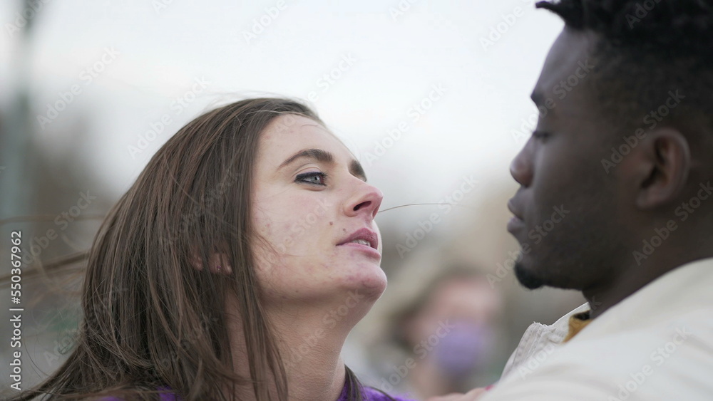 Interracial couple kissing, candid tender affection millennial couple2 Interracial couple kissing, candid tender affection millennial couple2