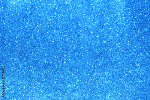 Light blue glitter background...Texture of light blue glitter particles.