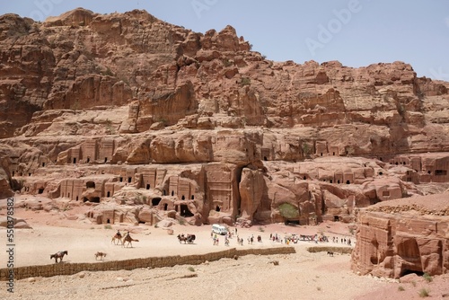 Street of Facades and dry riverbad of Wadi Musa in Petra, Jordan. Petra is ancient Nabataean city,  considered one of seven new wonders of world and is  world heritage site.