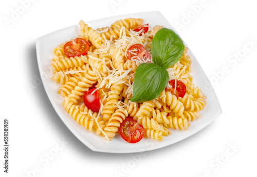 A baked dish of fusilli or pasta spirals, with cherry tomatoes, ricotta and parmesan