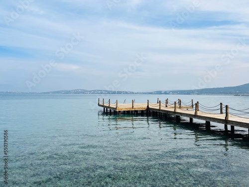 Beautiful wooden pier at the sea  sea horizon