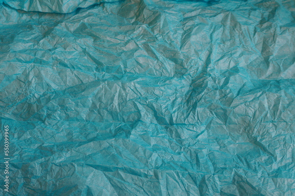 Obraz premium Textured Blue-Green Wrapping Paper Tissue as Background
