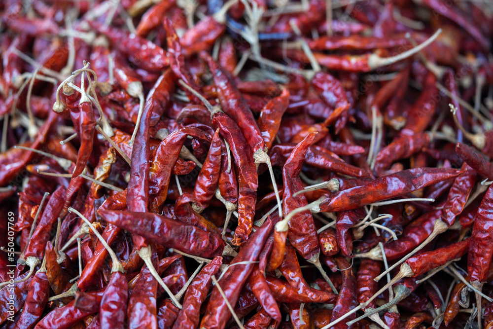 Lot of dried chili as a food background.
Lot of dried chili as a food background.