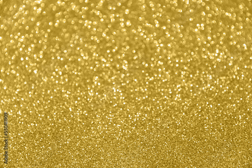 Glitter sparkling gold bokeh background © Asia Tsyhankova