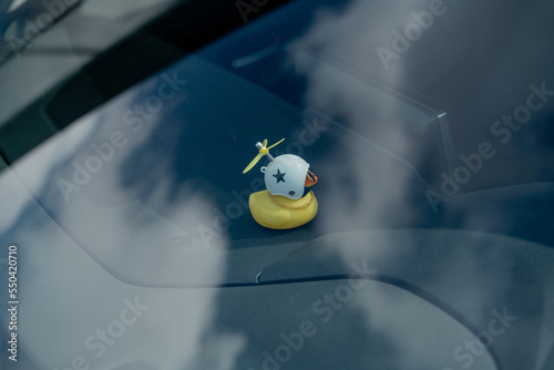 Photography A toy duck decorates the interior of the car.