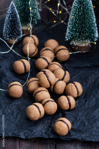 Lady's kisses, traditional Italian nut cookies with coffee and chocolate filling.