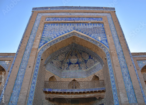 Close-up Madrassah of Ala-Kuli Khan in oriental style and ornment in the old city of Khiva (Xiva) in Uzbekistan