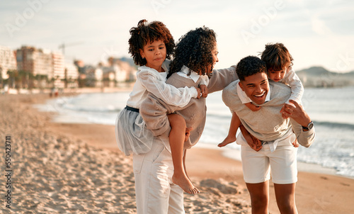 African American family on the beach on the weekend © Valerii Apetroaiei