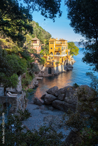 Beautiful bay with colorful houses and remote rocky Hidden Beach- Portofino luxury travel destination © afinocchiaro