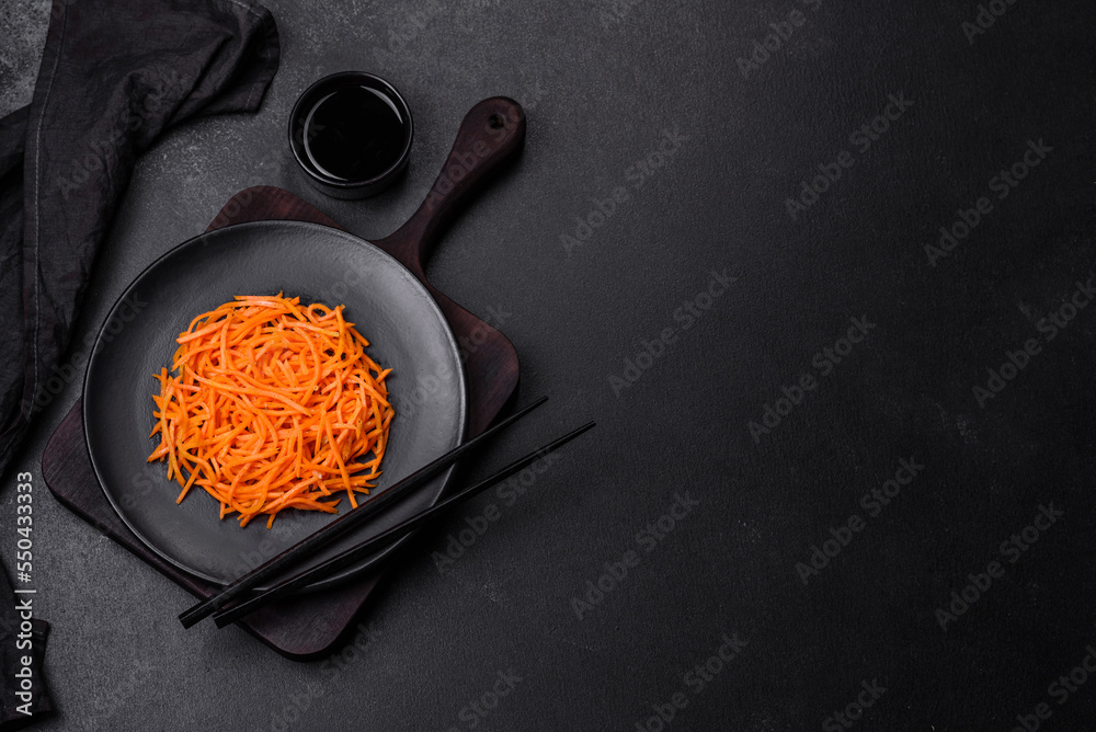 Tasty spicy Korean carrot with spices and herbs