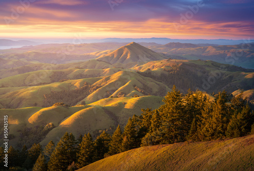 A vibrant sunset over the rolling hills of the north bay, California.