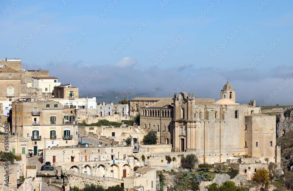 View of Sassi di Matera a historic district in the city of Matera, well-known for their ancient cave dwellings in Italy, Europe