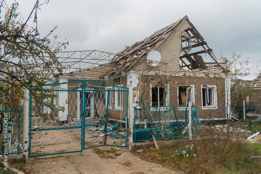 Countryside. House destroyed by shelling. War in Ukraine. Terror of the civilian population Countryside. House destroyed by shelling. War in Ukraine. Terror of the civilian population