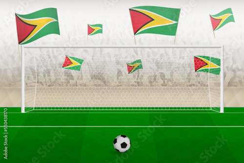 Guyana football team fans with flags of Guyana cheering on stadium, penalty kick concept in a soccer match.