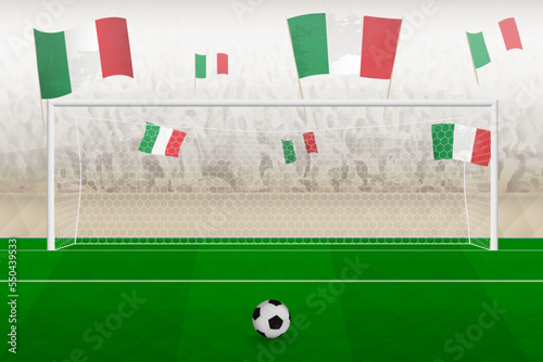Italy football team fans with flags of Italy cheering on stadium, penalty kick concept in a soccer match.