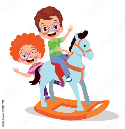 happy boy swinging on toy horse