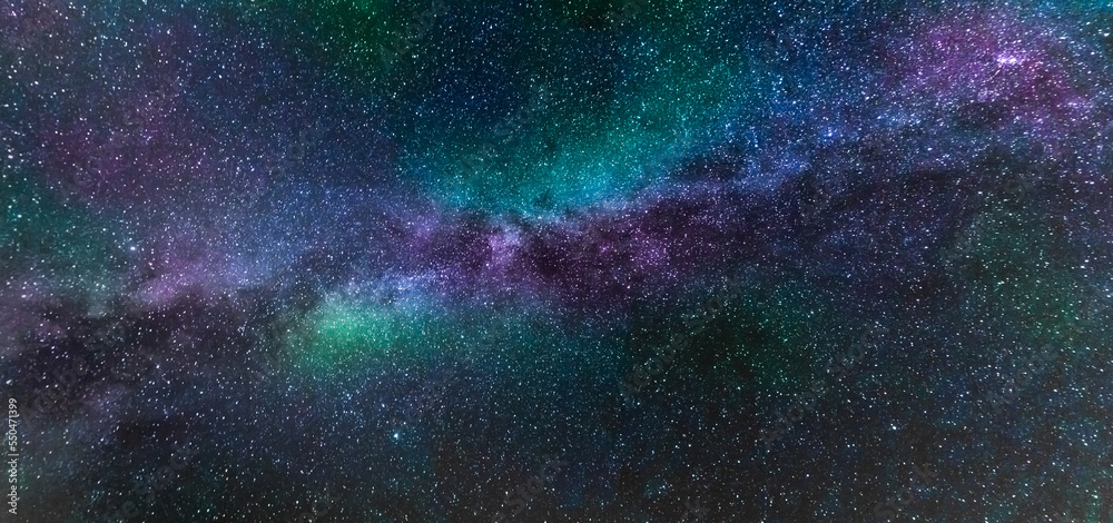 The galactic cloud of the Milky Way stretching across the sky and the stars of the universe.