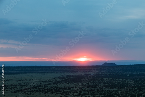 Sunrise over the San Francisco Volcano field in Arizona on a cloudy morning from an elevate position.