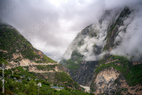 View of a valley at Tiger Leaping Gorge with a scenic canyon on the Jinsha River, Lijiang Yunnan