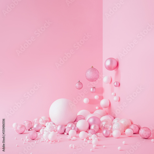 Creative Abstract Festive composition with Christmas design pink pastel color background and pink and white balls Minimal concept of New Year's and Christmas Holidays. Flat lay.